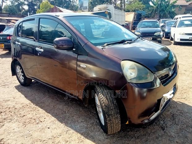 Daihatsu Mira 2013 Maroon