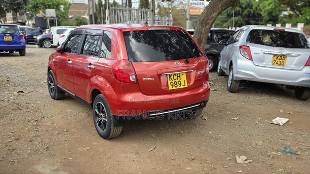 Mazda Verisa 2009 Orange