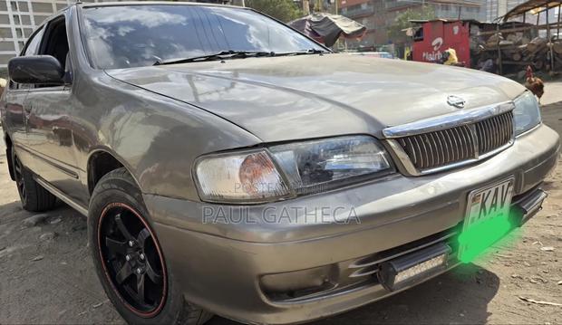 Nissan FB14 1999 Gold