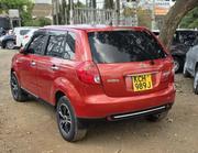 Mazda Verisa 2009 Orange for sale