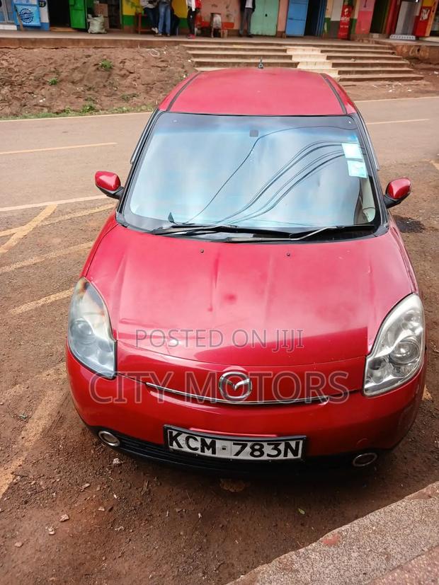 Mazda Verisa 2010 Red