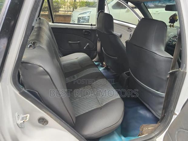 Toyota Corolla Hatchback 1999 White