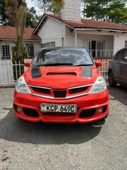 Nissan Tiida 2010 Orange for sale
