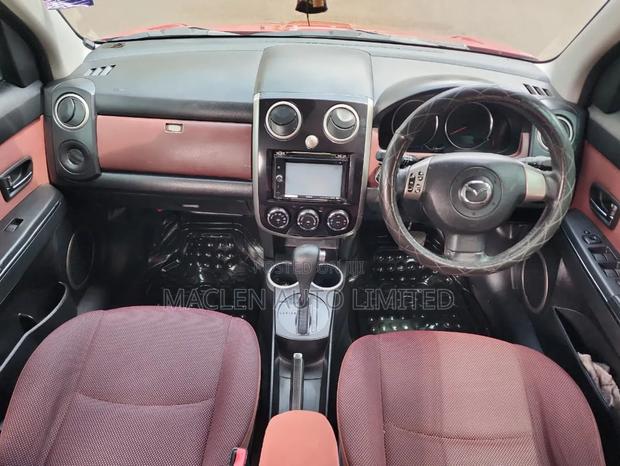 Mazda Verisa 2010 Red