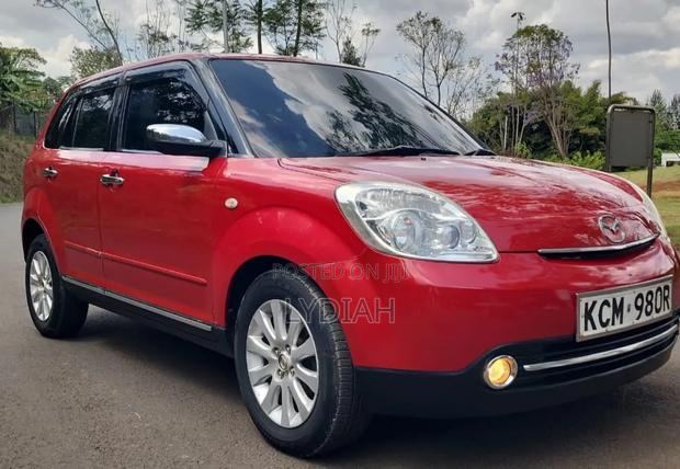 Mazda Verisa 2010 Red