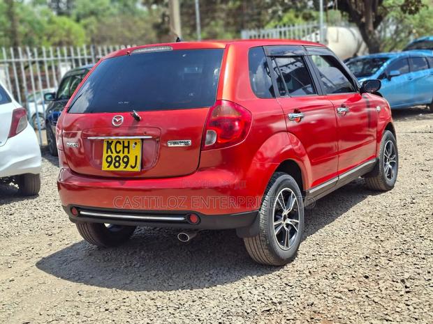 Mazda Verisa 2009 Red